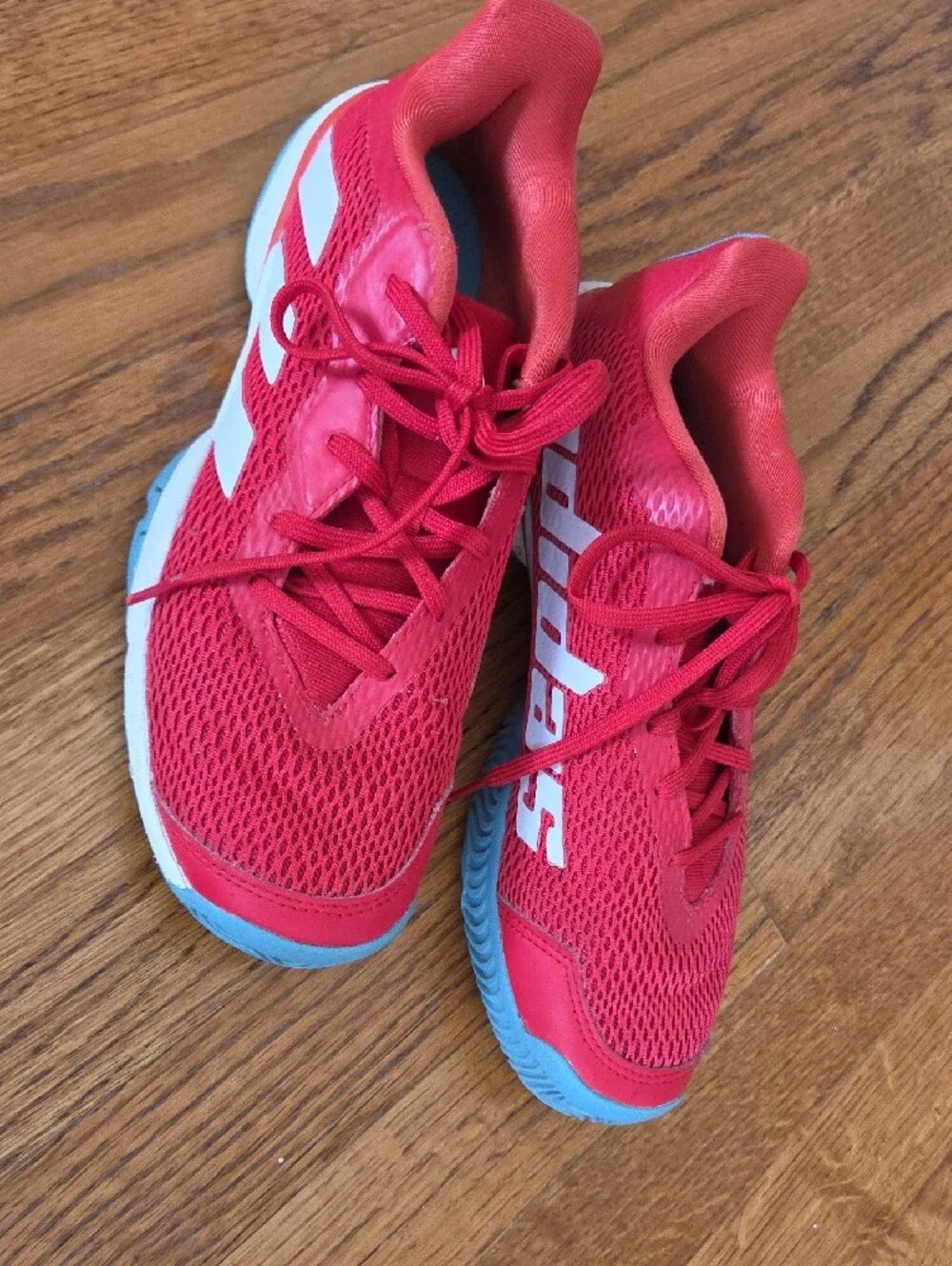 Red ADIDAS Tennis Shoes with Blue Soles